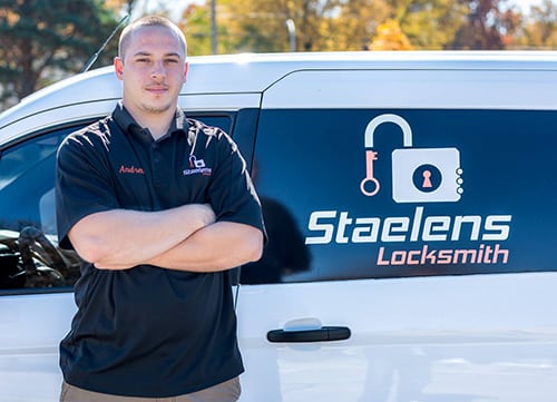Andrew Staelens in front of his locksmith van in Berkley, MI